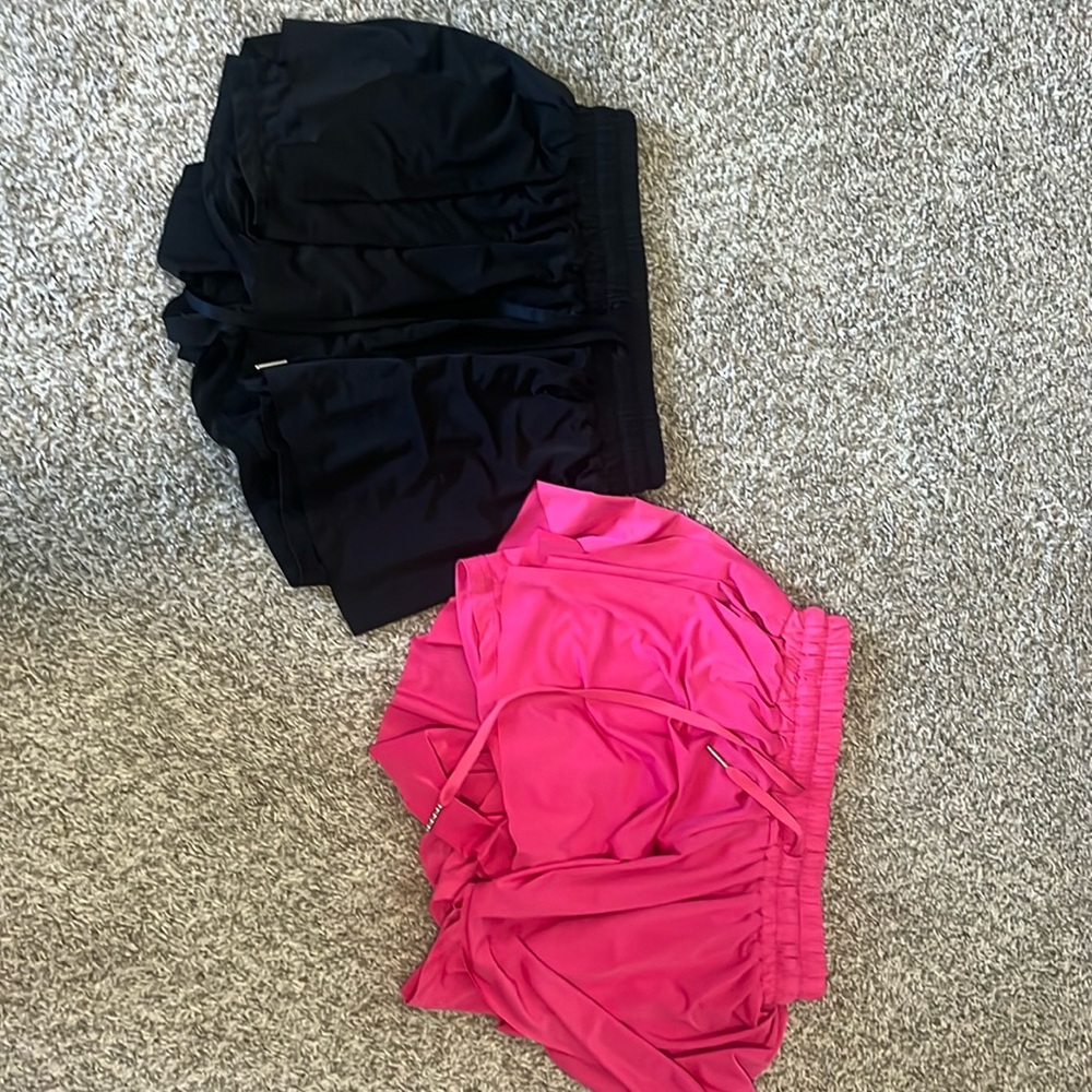 black and hot pink flowy shorts with built in shorts
